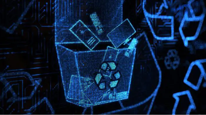 image d’appareil numérique dans 
                une poubelle de recyclage